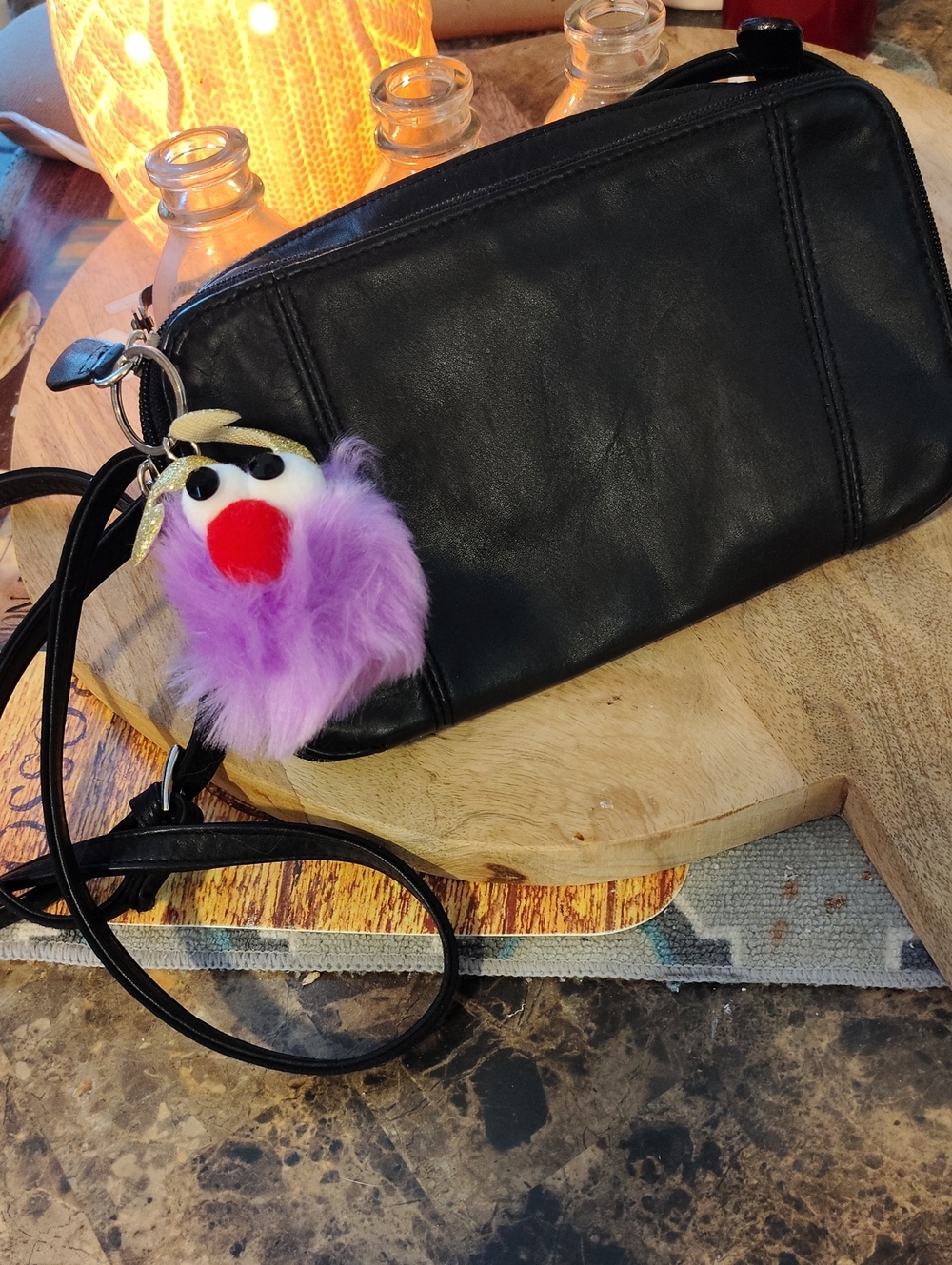 St. John's Bay Black Crossbody Wristlet with Purple Pom Charm